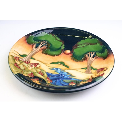 77 - Moorcroft pottery plate in the Evening Sky pattern, of circular form, designed by Emma Bossons, impr... 