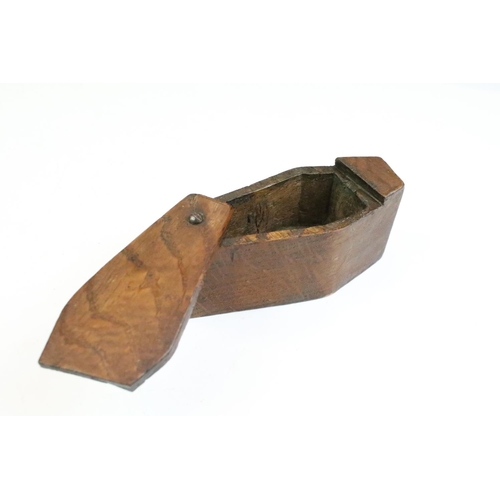 91 - 19th century carved oak table top snuff box in the form of a coffin, with hinged lid, measures appro... 