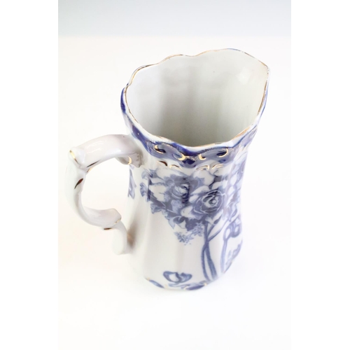 101 - Set of five Ironstone blue & white graduating jugs with gilt details, plus a 19th century W.H. Grind... 