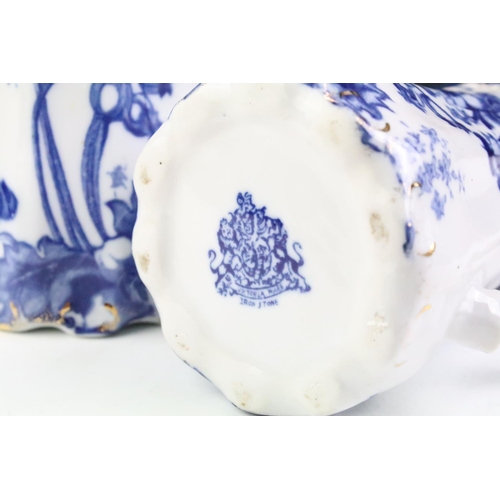 101 - Set of five Ironstone blue & white graduating jugs with gilt details, plus a 19th century W.H. Grind... 