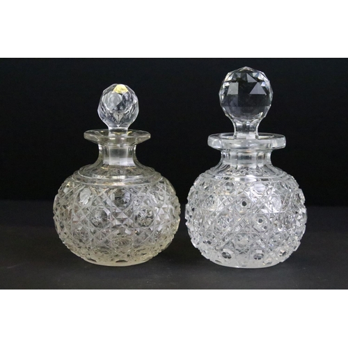 110 - Collection of 12 cut glass perfume bottles & jars to include silver collared & silver lidded example... 