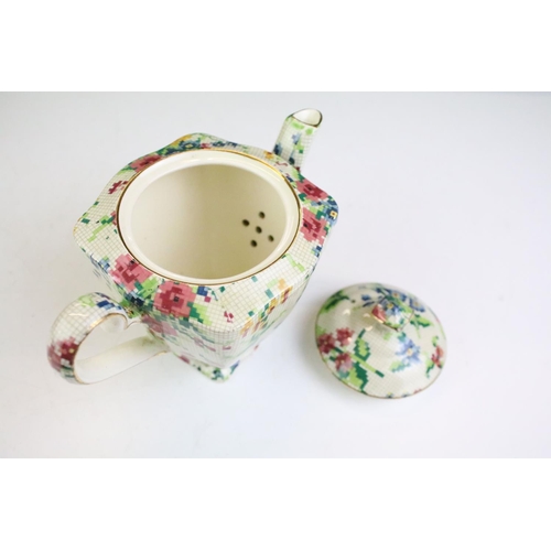 128 - Royal Winton Grimwades Queen Anne pattern tea set for two, transfer printed with chintz floral needl... 