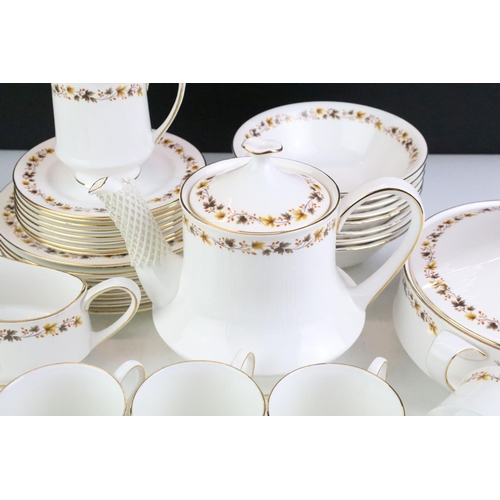 132 - Staffordshire Bone China Royal Kent 'Golden Glory' eight setting tea & dinner service to include cup... 