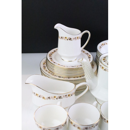 132 - Staffordshire Bone China Royal Kent 'Golden Glory' eight setting tea & dinner service to include cup... 