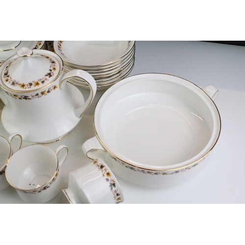 132 - Staffordshire Bone China Royal Kent 'Golden Glory' eight setting tea & dinner service to include cup... 