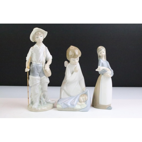 146 - Collection of ten Lladro porcelain figures / figure groups to include Friendship (1230), Boy Awakeni... 