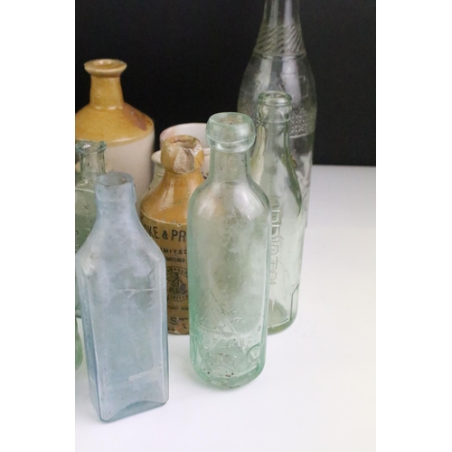 152 - Collection of 19th Century and later glass and stoneware bottles, mostly glass examples with brewery... 