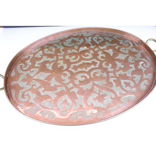 186 - Early 20th Century hammered copper tray having stylised hammered detailing to tray and twin brass ha... 