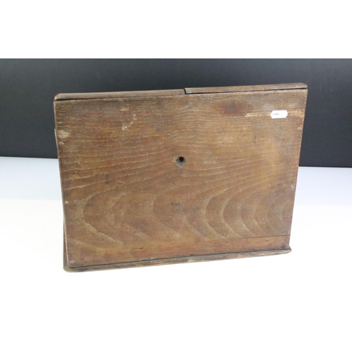 189 - Early 20th Century oak cased desk tidy having a pair of sloped twin doors with sectional interior. M... 