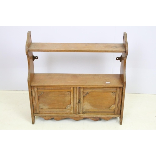 701 - Victorian oak wall hanging cabinet shelf having two shelves to top having twin door cabinet below. M... 