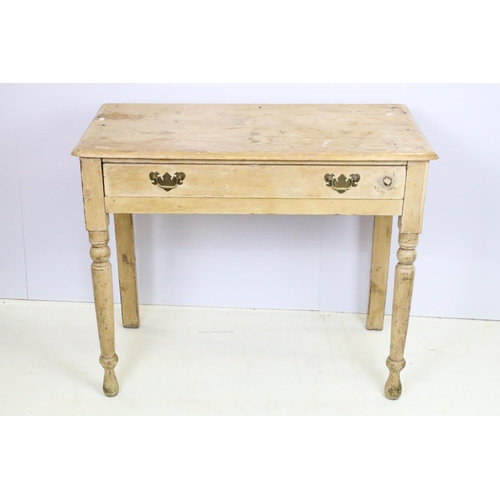 708 - 19th Century Victorian pine side table having rectangular top above single drawer with twin handles ... 