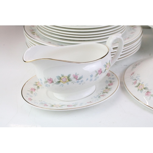 141 - Mayfair ceramic dinner service having a white ground with pink floral details to include lidded dish... 