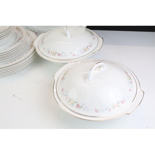 141 - Mayfair ceramic dinner service having a white ground with pink floral details to include lidded dish... 