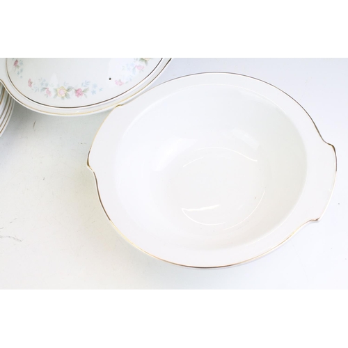 141 - Mayfair ceramic dinner service having a white ground with pink floral details to include lidded dish... 