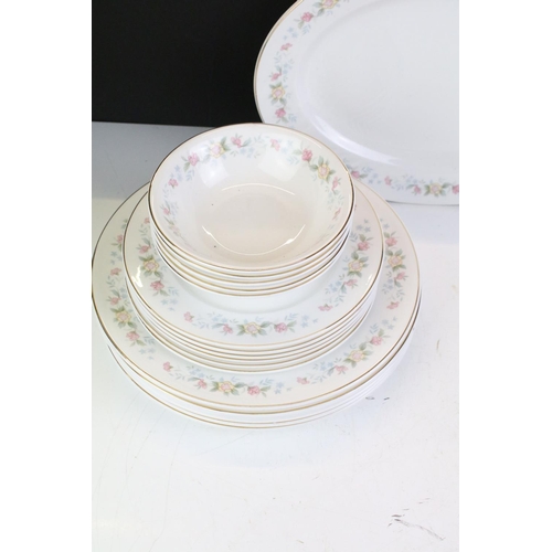 141 - Mayfair ceramic dinner service having a white ground with pink floral details to include lidded dish... 