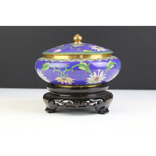 214 - Oriental champleve enamel cloisonne bowl with lid and wooden stand