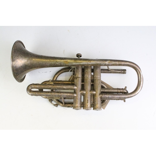 225 - Barratts of Manchester silverplated cornet with mother of pearl inlaid valves. Measures 33cm wide.