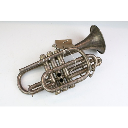 225 - Barratts of Manchester silverplated cornet with mother of pearl inlaid valves. Measures 33cm wide.