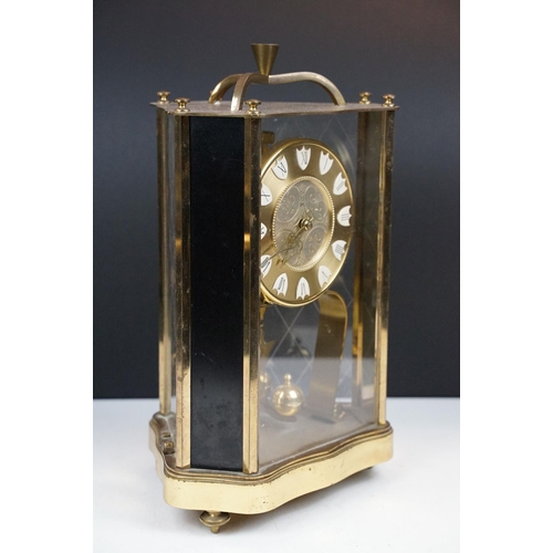 162 - 20th century brass anniversary mantel clock with ball pendulum, the dial marked 'ZAL', housed within... 