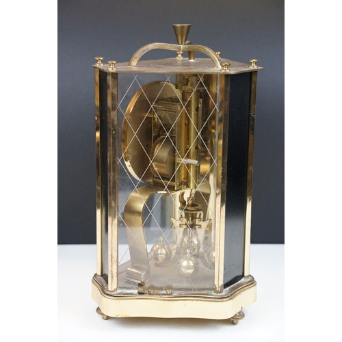 162 - 20th century brass anniversary mantel clock with ball pendulum, the dial marked 'ZAL', housed within... 