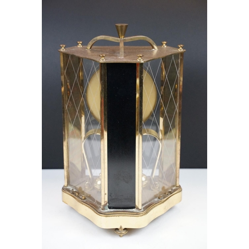 162 - 20th century brass anniversary mantel clock with ball pendulum, the dial marked 'ZAL', housed within... 