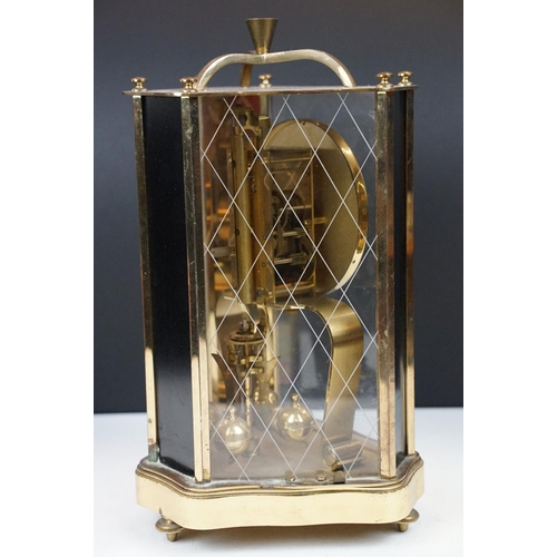 162 - 20th century brass anniversary mantel clock with ball pendulum, the dial marked 'ZAL', housed within... 