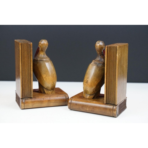 163 - Pair of Art Deco carved oak bookend modelled as birds, with cherry Bakelite details, approx 15cm tal... 