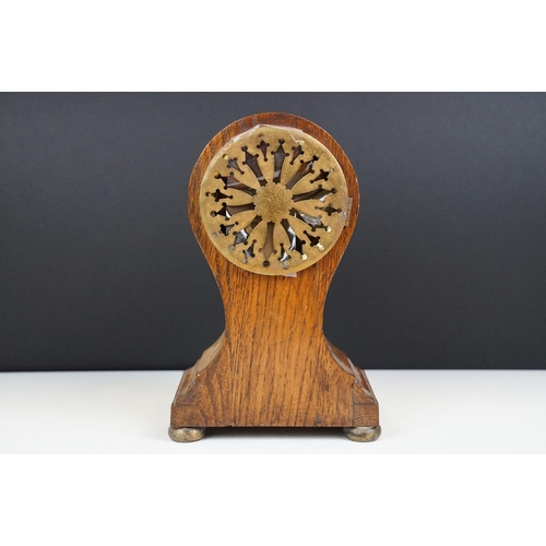 174 - Edwardian balloon oak mantel clock with white enamel dial and carved detail, approx 22.5cm high