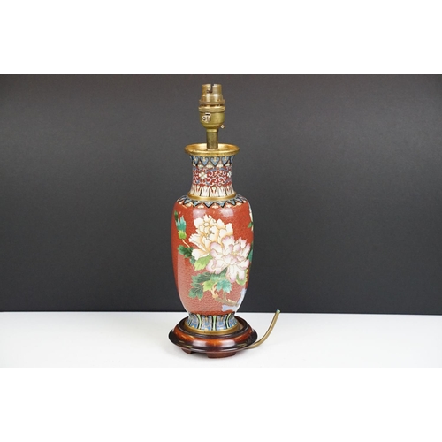 176 - Cloisonne Table Lamp decorated with chrysanthemums on a red ground, raised on a wooden stand, 34cm h... 