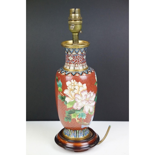 176 - Cloisonne Table Lamp decorated with chrysanthemums on a red ground, raised on a wooden stand, 34cm h... 