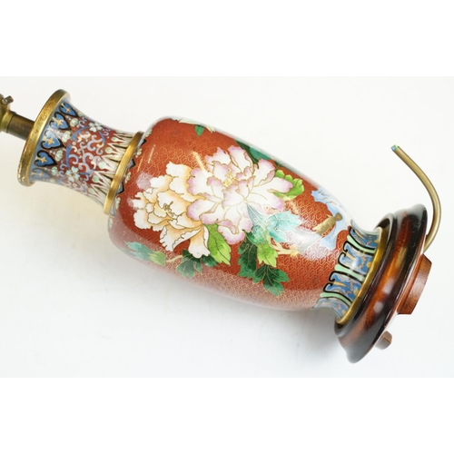 176 - Cloisonne Table Lamp decorated with chrysanthemums on a red ground, raised on a wooden stand, 34cm h... 