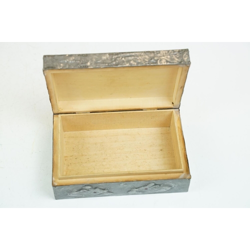 179 - Arts and Crafts Pewter embossed Box, the hinged lid decorated with cat wearing a bow tie with irides... 