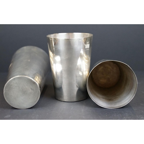 181 - Early 20th century set of Three Silver Plated Stacking Stirrup Cups and a Silver Plated Double Measu... 