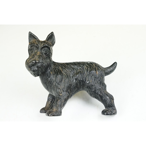 182 - Cast iron dog door stop 