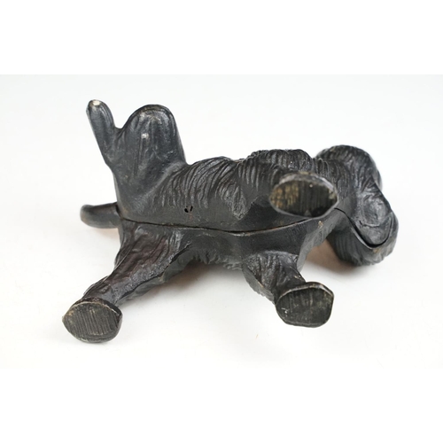 182 - Cast iron dog door stop 