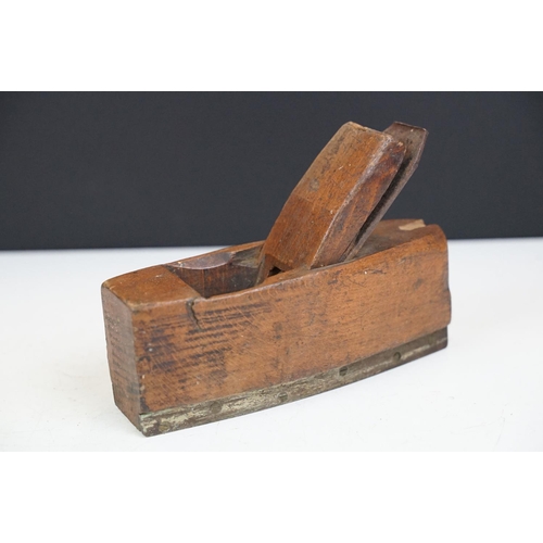 567 - Four woodworking planes to include two H J Matthews examples together with an early 20th Century oak... 