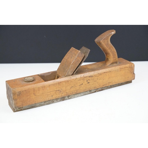 567 - Four woodworking planes to include two H J Matthews examples together with an early 20th Century oak... 