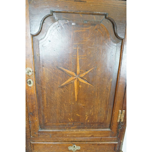 697 - Georgian oak corner cupboard, with dentil cornice above panelled door with parquetry geometric star ... 