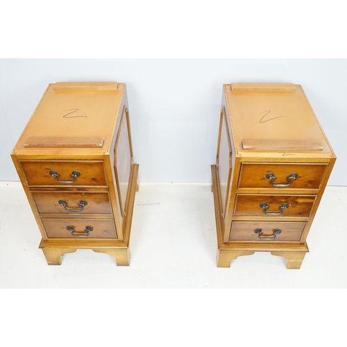 704 - 20th Century walnut veneered twin pedestal desk having a green leather top with three drawers to des... 