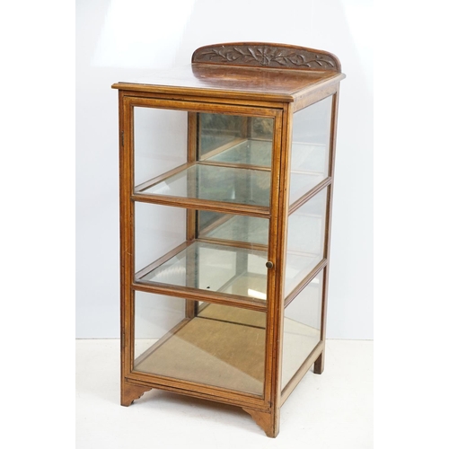 706 - Early 29th Century Edwardian inlaid mahogany display cabinet having a mirror back with glazed panels... 