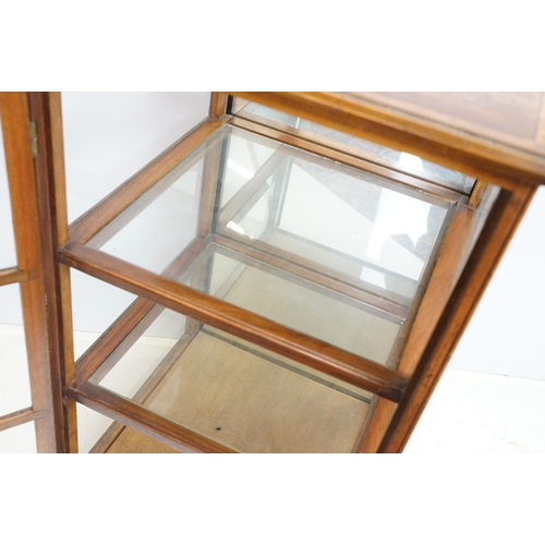 706 - Early 29th Century Edwardian inlaid mahogany display cabinet having a mirror back with glazed panels... 