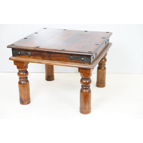 695 - 20th Century fruit wood occasional table having a flared top with block legs and metal banding. Meas... 