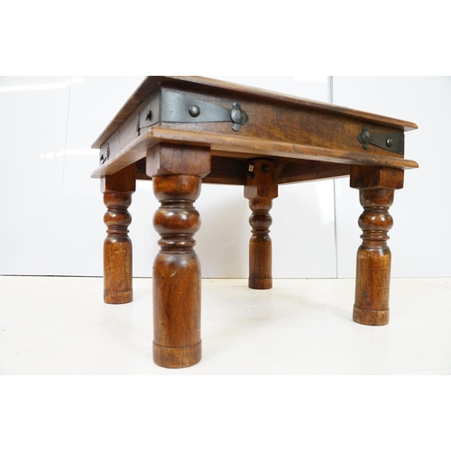 695 - 20th Century fruit wood occasional table having a flared top with block legs and metal banding. Meas... 