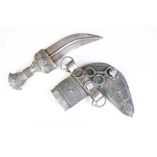 186 - A late 19th / early 20th century Yemin silver mounted over leather sheath Jambiya.