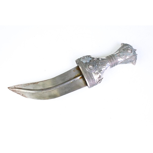 186 - A late 19th / early 20th century Yemin silver mounted over leather sheath Jambiya.