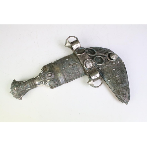 186 - A late 19th / early 20th century Yemin silver mounted over leather sheath Jambiya.