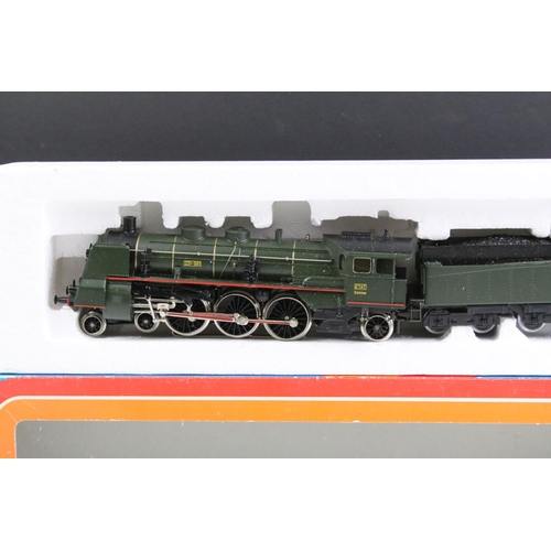 120 - Four boxed Marklin HO gauge locomotives to include 3083, 3087, 3089 & 3003