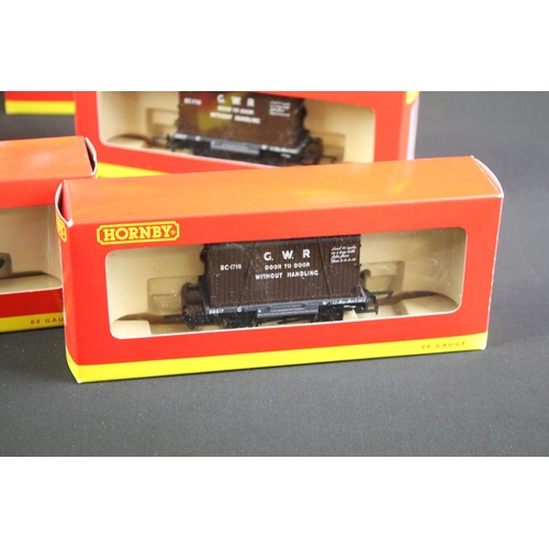 127 - 26 Boxed Hornby OO gauge rolling stock items and sets to include 2 x Railroad R6367 Coal Wagon Packs