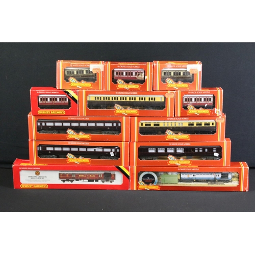 130 - 41 Boxed Hornby OO gauge items of rolling stock to include coaches, vans and wagons featuring R413 O... 