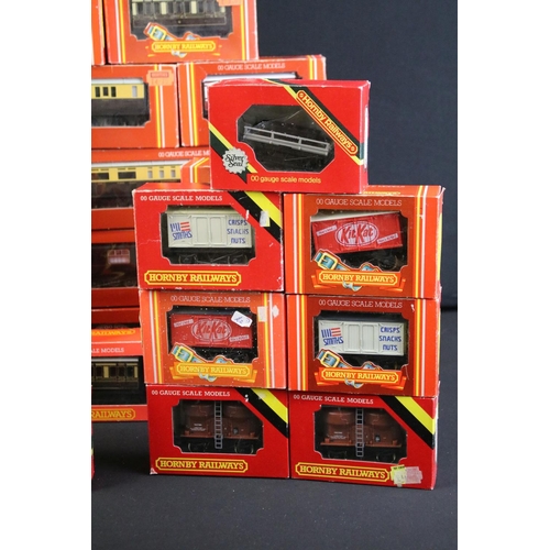 130 - 41 Boxed Hornby OO gauge items of rolling stock to include coaches, vans and wagons featuring R413 O... 